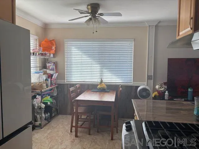 a bedroom with a bed and a large bathroom