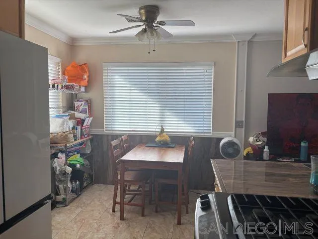 944 Maya Street Spring Valley, CA 91977 - Photo 10 of 20 a dining room with furniture and window