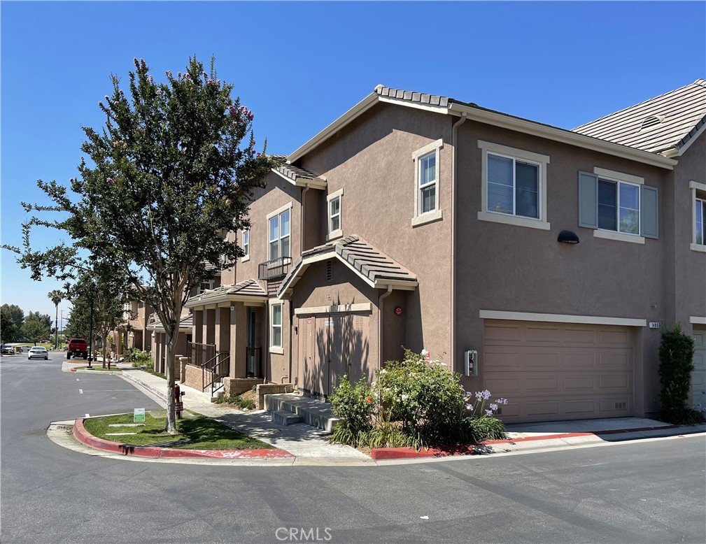 1488 Springfield Way Upland, CA 91786 - Photo 2 of 16 a front view of a house with entertaining space