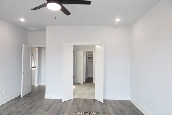 a bathroom with a double vanity sink and mirror