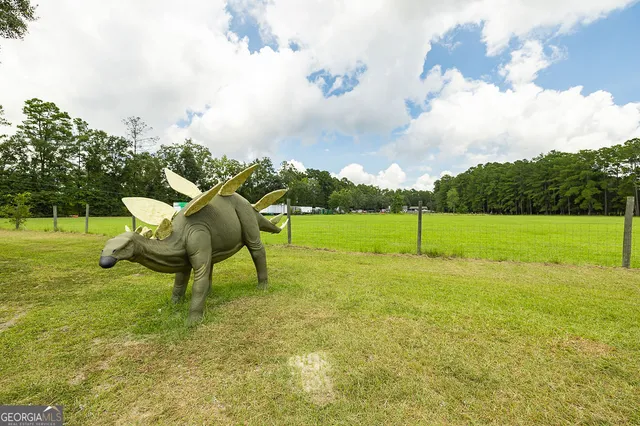 a view of a golf course with a swimming pool