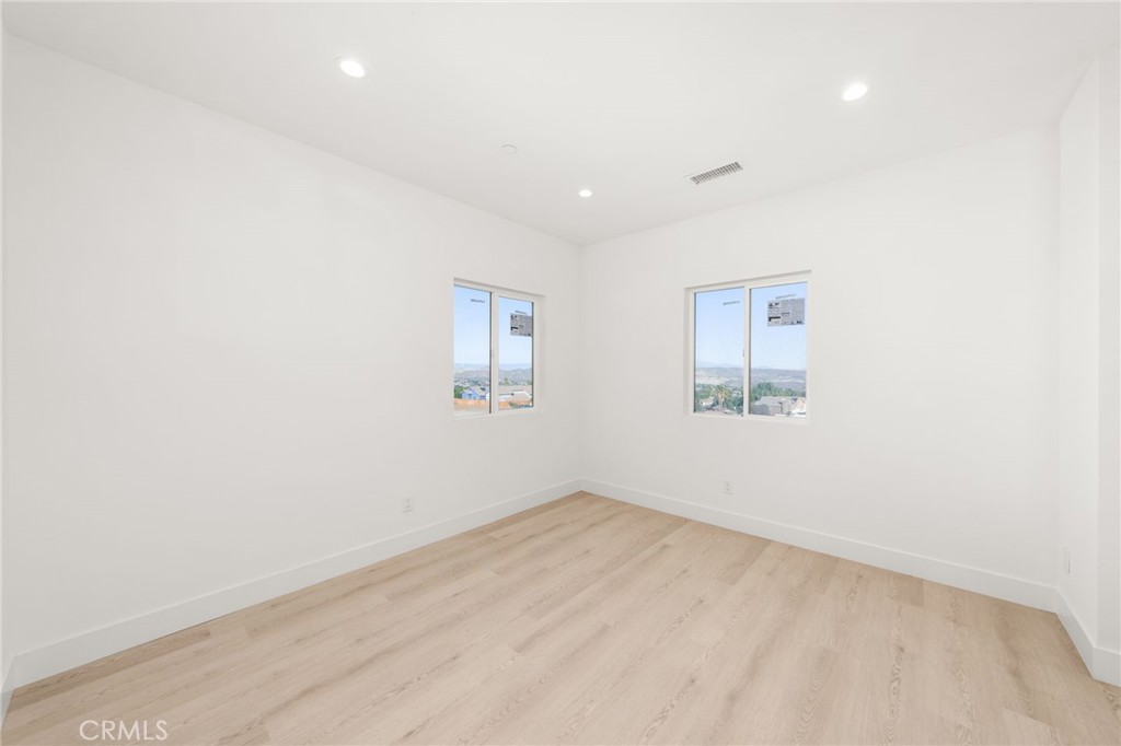 3704 Howe Street Corona, CA 92881 - Photo 18 of 26 an empty room with a empty space and window