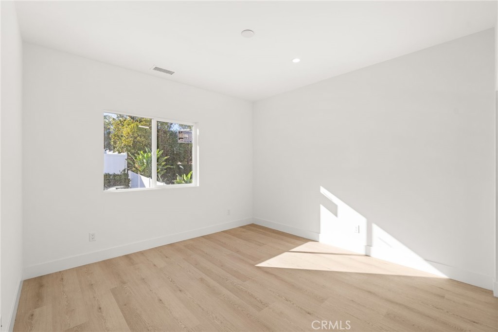 3704 Howe Street Corona, CA 92881 - Photo 21 of 26 an empty room with windows