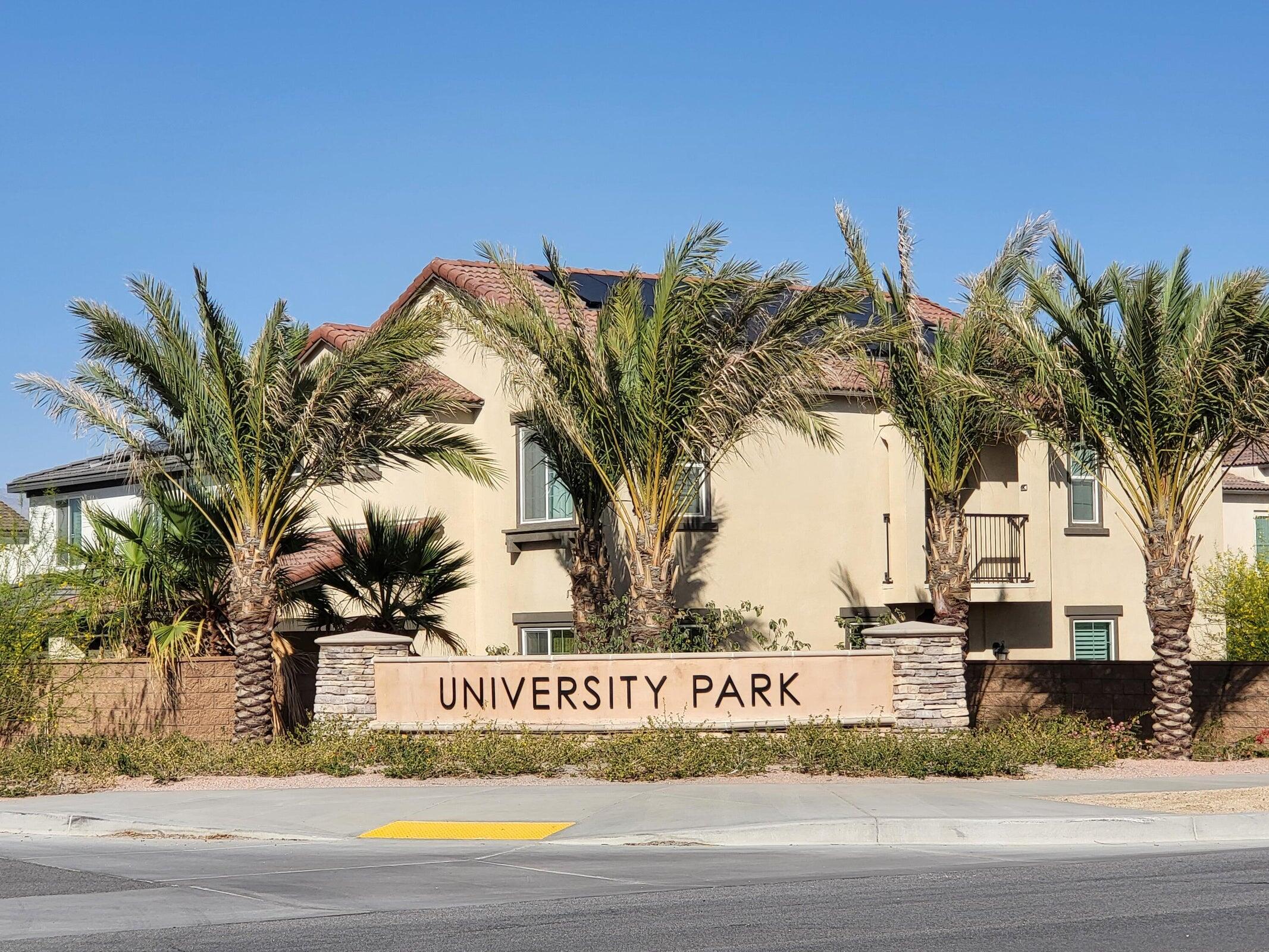 76273 Cornell Way Palm Desert, CA 92211 - Photo 12 of 16 a view of a palm tree with sign board