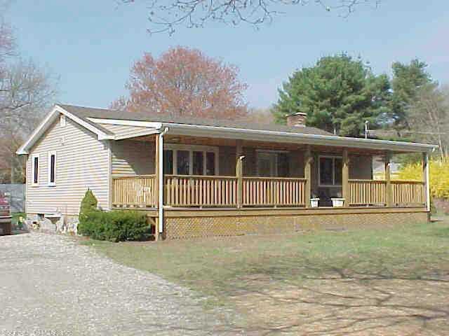 8 North Society Road Canterbury, CT 06331 - Photo 1 of 1 a front view of a house with garden