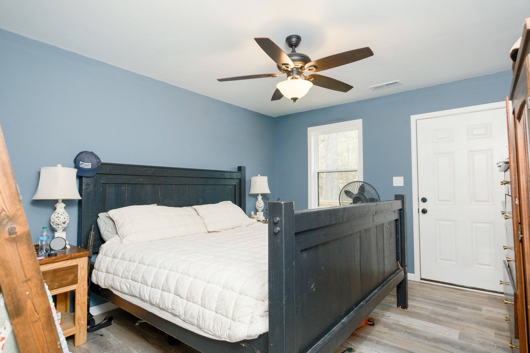 55 Sumerfield Drive Springville, TN 38256 - Photo 28 of 32 a bedroom with a bed and a window