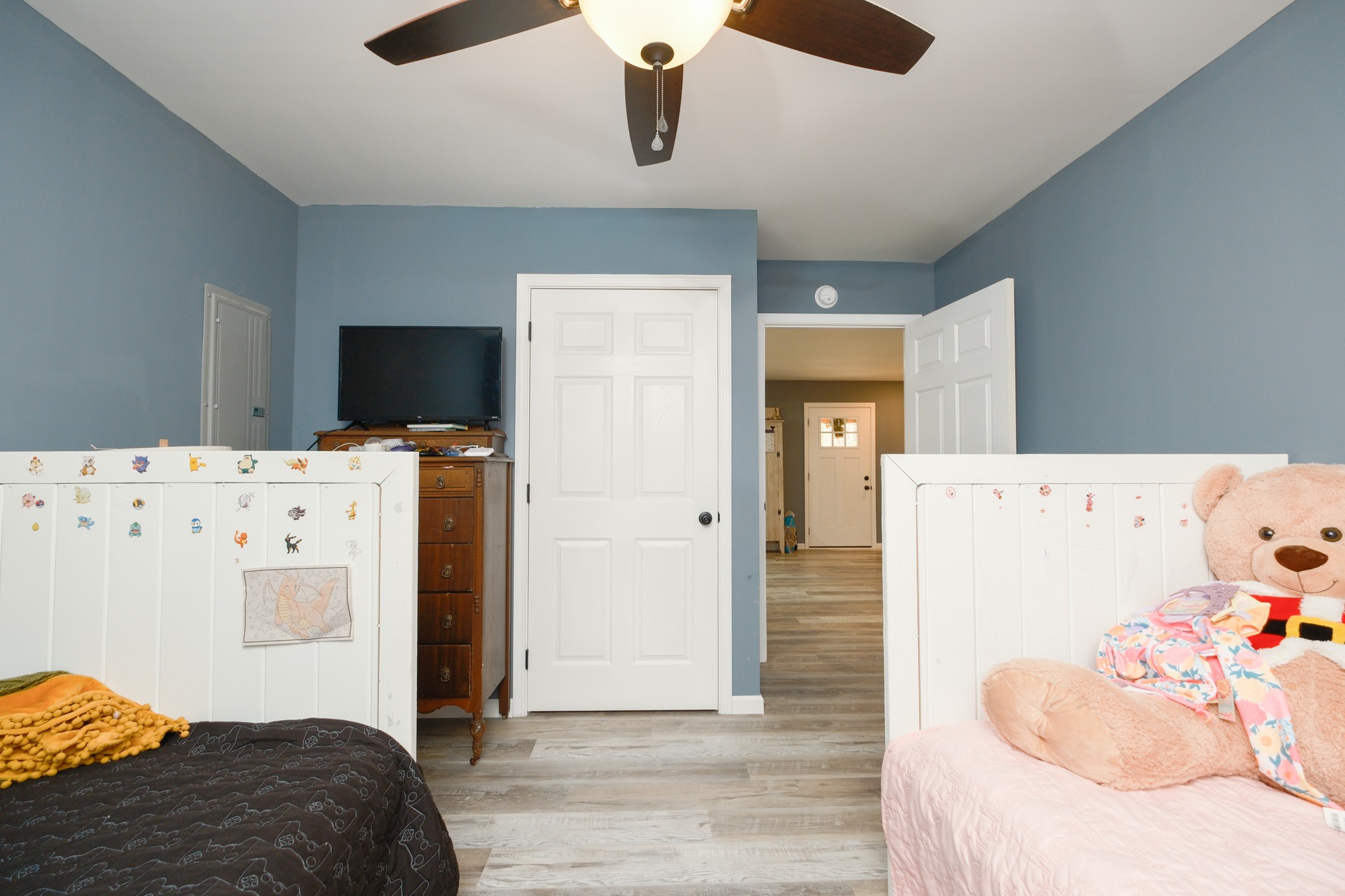 55 Sumerfield Drive Springville, TN 38256 - Photo 31 of 32 a bedroom with a bed and a flat screen tv