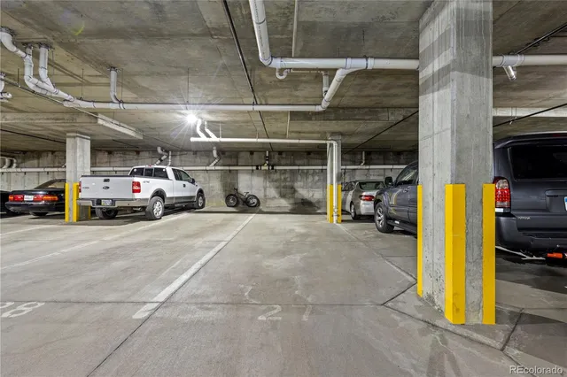 a view of a patio with table and chairs and potted plants