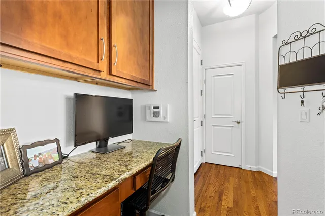 a bedroom with a bed and flat screen tv
