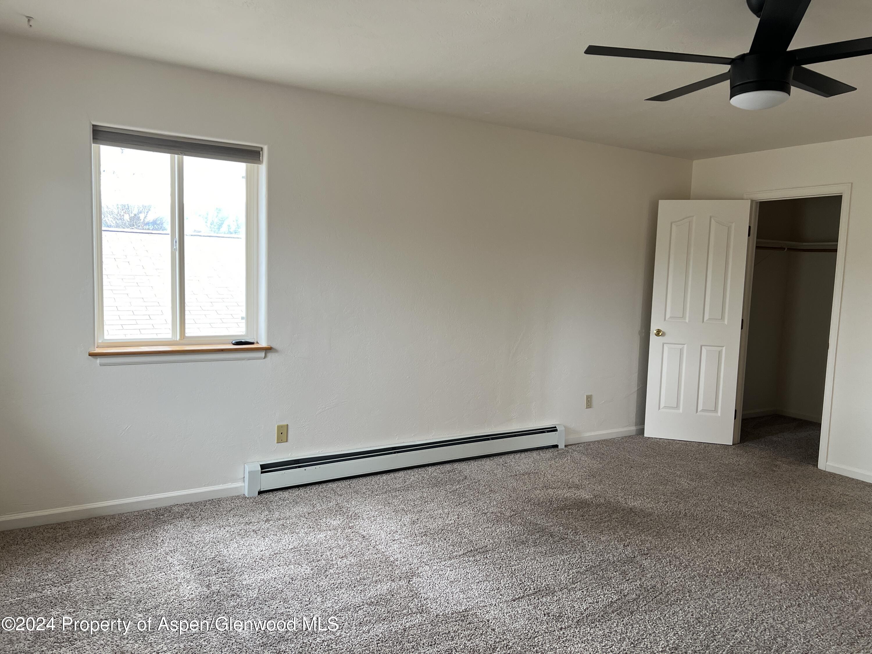 765 Fir Avenue Rifle, CO 81650 - Photo 15 of 34 a view of an empty room with a window