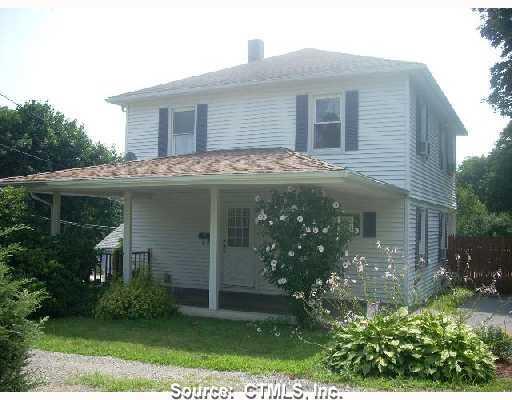 421 Harland Road Norwich, CT 06360 - Photo 1 of 1 a front view of a house with garden