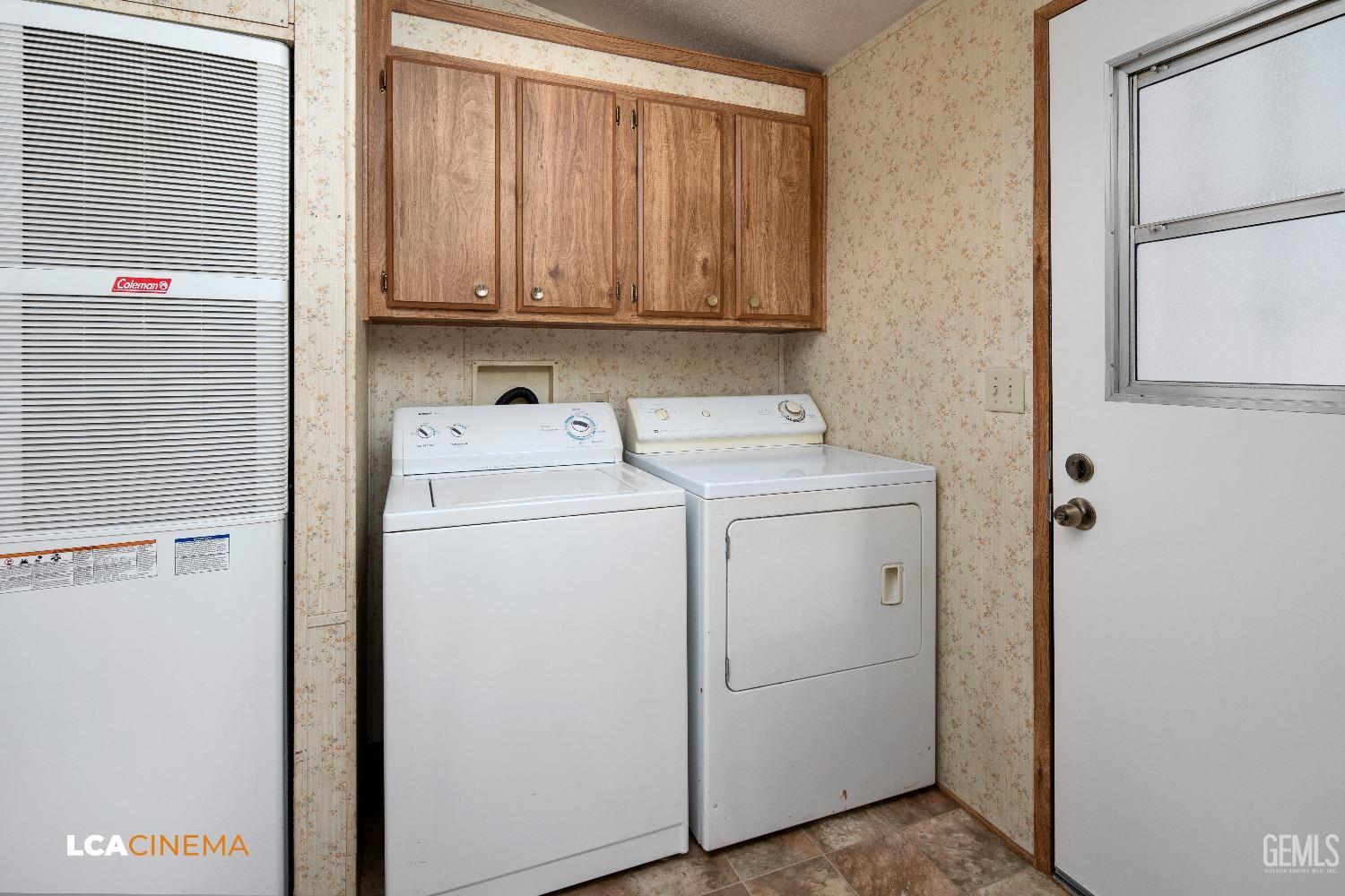 Undisclosed Address Bakersfield, CA 93307 - Photo 16 of 20 a utility room with dryer and washer