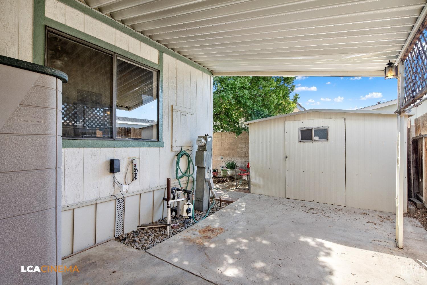 Undisclosed Address Bakersfield, CA 93307 - Photo 18 of 20 a view of a porch with furniture
