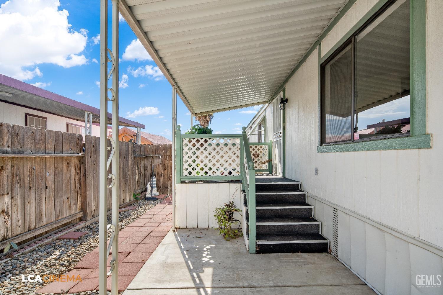 Undisclosed Address Bakersfield, CA 93307 - Photo 19 of 20 a view of entryway with wooden floor