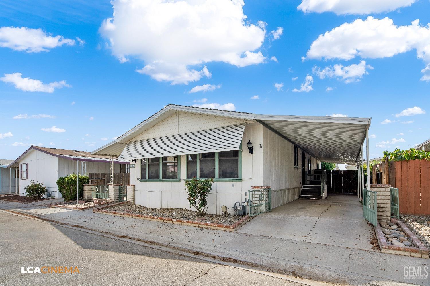 Undisclosed Address Bakersfield, CA 93307 - Photo 2 of 20 a view of a house with a patio