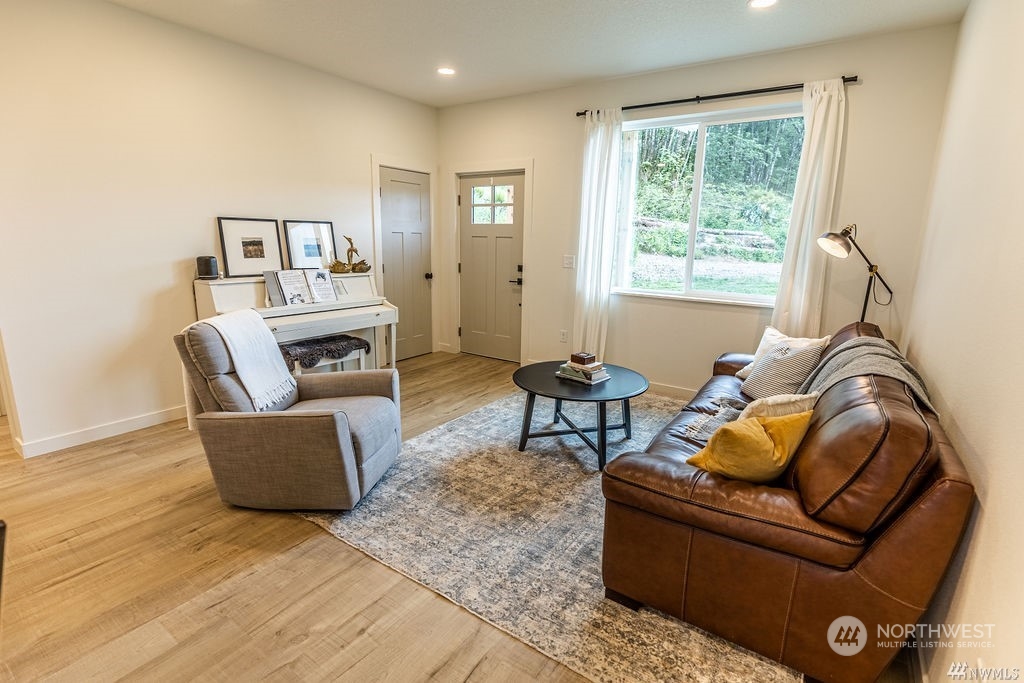 3021 Stella Road Longview, WA 98632 - Photo 14 of 39 a living room with furniture and a window