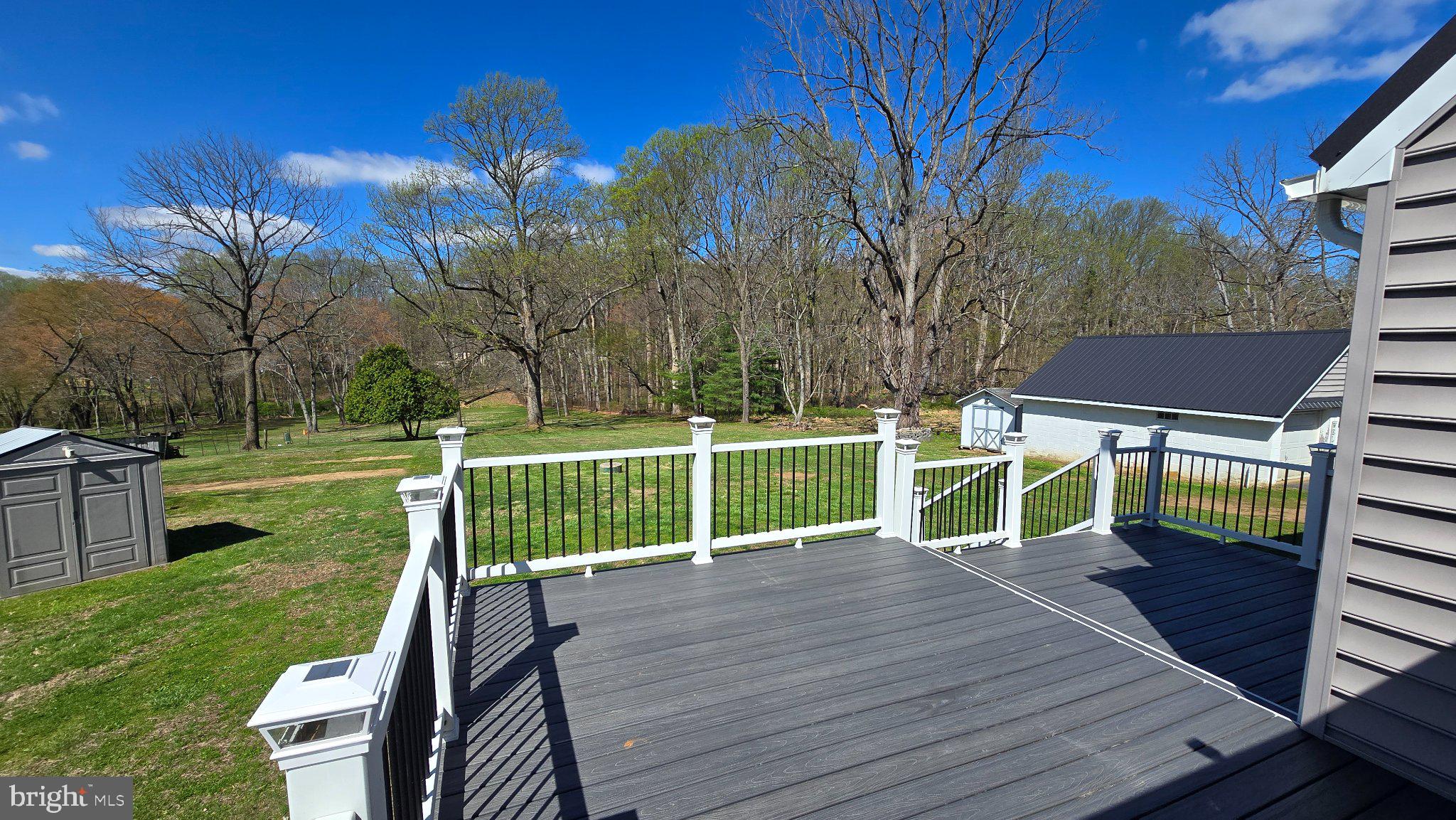 1233 New London Road Landenberg, PA 19350 - Photo 27 of 37 Serene deck with lush woodland views.