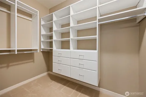 a view of an empty walk in closet