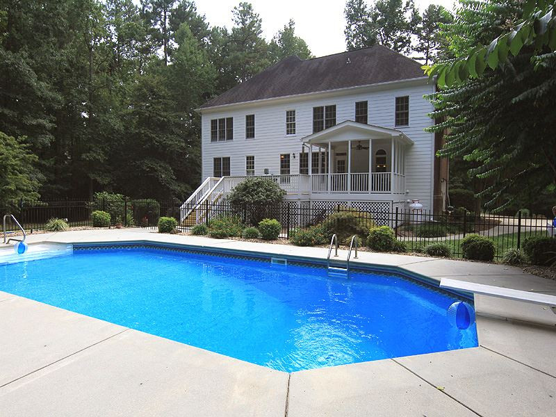 5305 Mill Dam Road Wake Forest, NC 27587 - Photo 21 of 25 Pool and rear of home