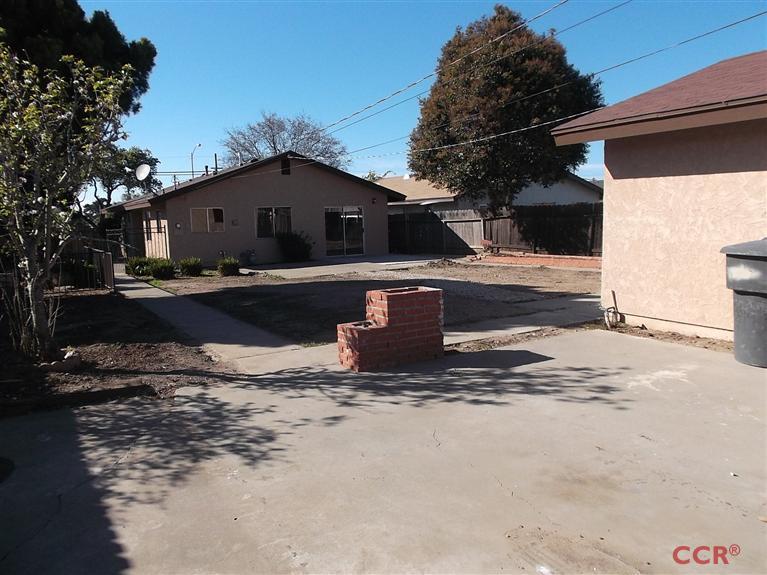 404 North A Street Lompoc, CA 93436 - Photo 15 of 15 a view of a house with snow on the road