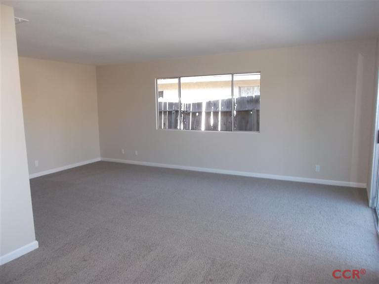 404 North A Street Lompoc, CA 93436 - Photo 5 of 15 an empty room with a window