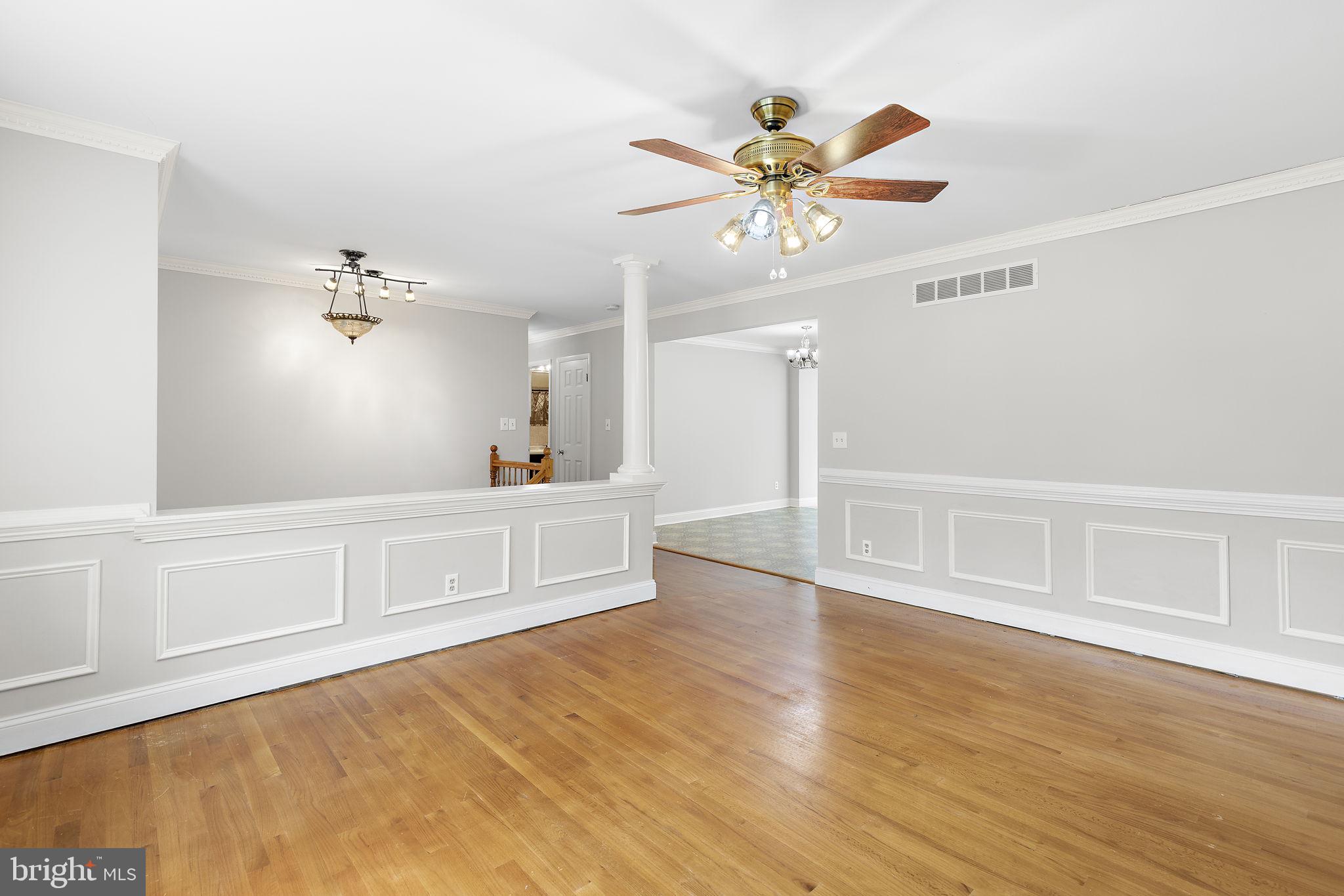 1404 Ryan Road Fallston, MD 21047 - Photo 8 of 50 Living room w/crown molding & column entry