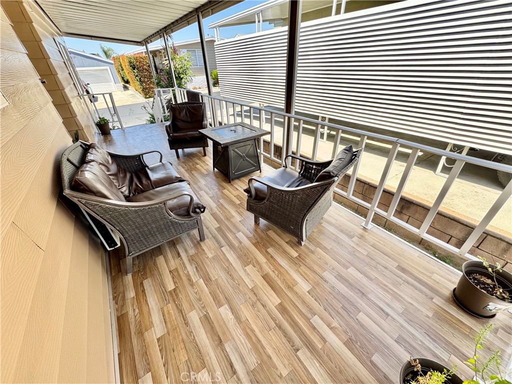 23301 Ridge Rte Drive, Unit 109 Laguna Hills, CA 92653 - Photo 15 of 46 a building outdoor space with patio furniture