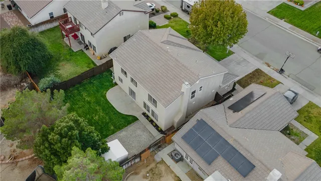 an aerial view of a house with garden
