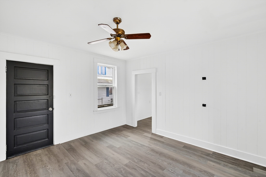 150 East Main Street Orange, MA 01364 - Photo 11 of 41 a view of room with hardwood floor and ceiling fan