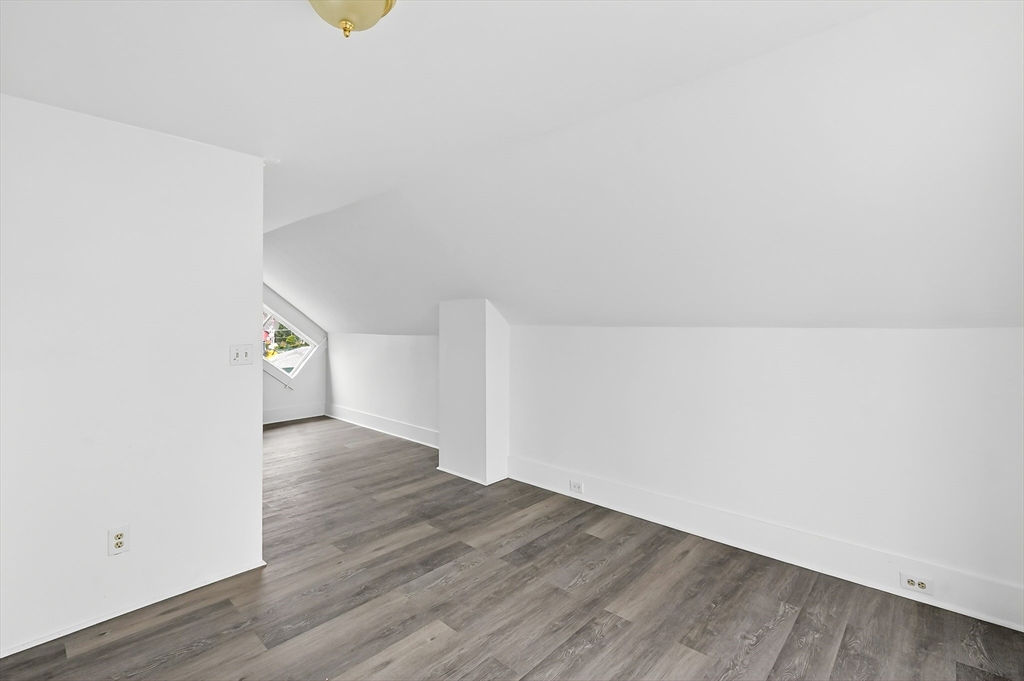 150 East Main Street Orange, MA 01364 - Photo 26 of 41 a view of an empty room with wooden floor