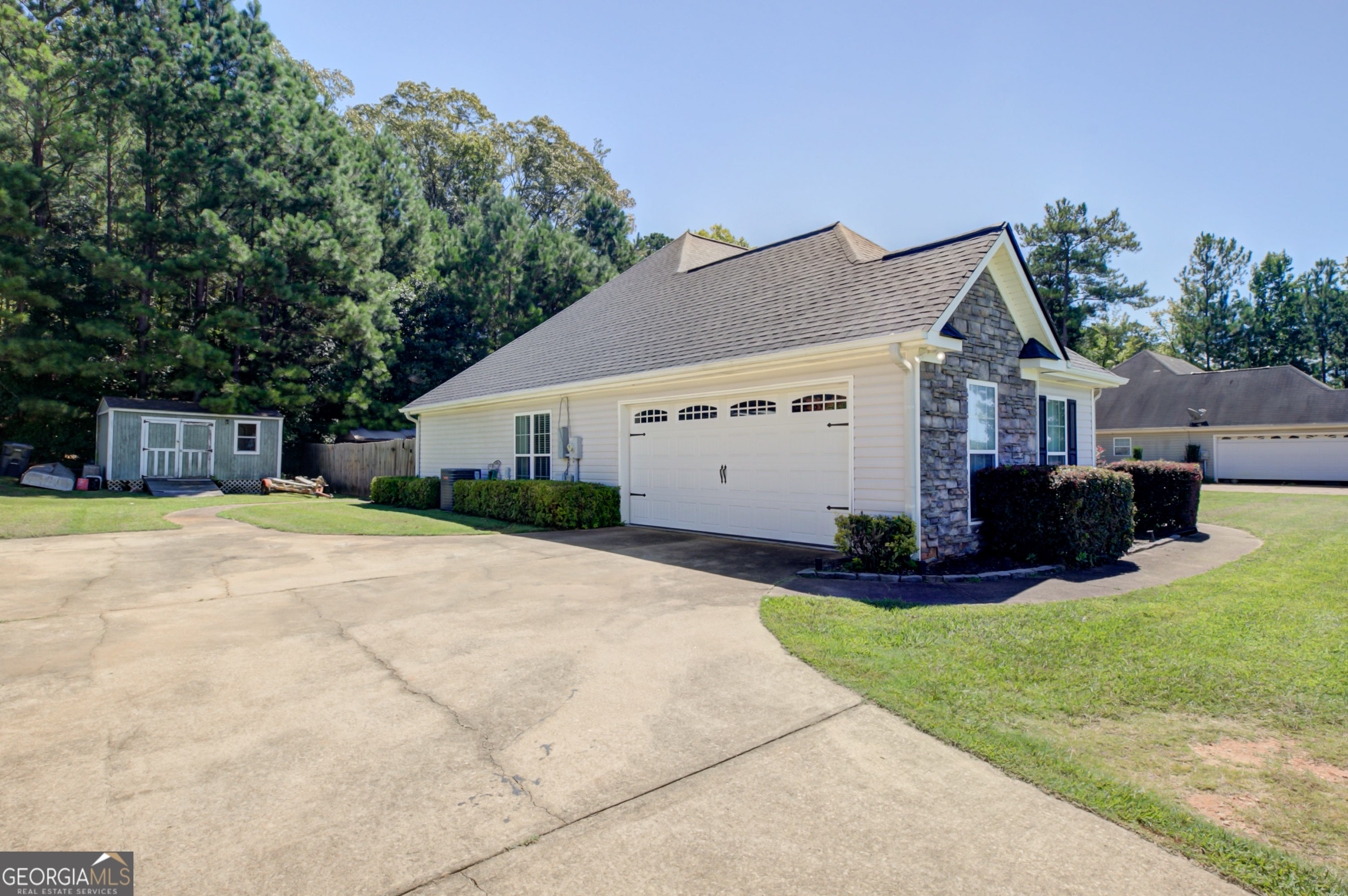 229 John Lovelace Road LaGrange, GA 30241 - Photo 38 of 59 a view of a house with a yard and a large tree