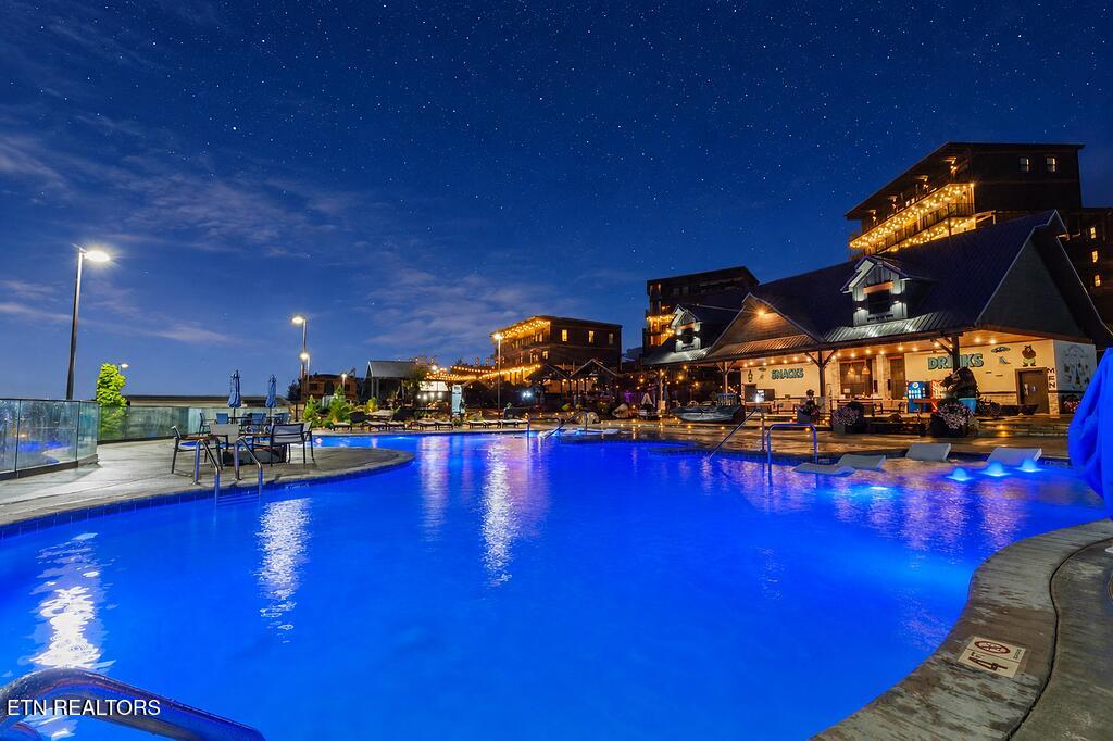 1319 Wildhorse Ridge Way, Unit LOT143R Sevierville, TN 37862 - Photo 53 of 57 Community Pool at nigh