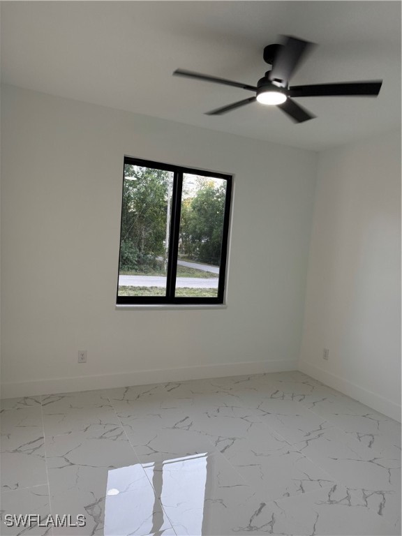 3701 East 3rd Street Lehigh Acres, FL 33936 - Photo 14 of 19 a view of an empty room with a window