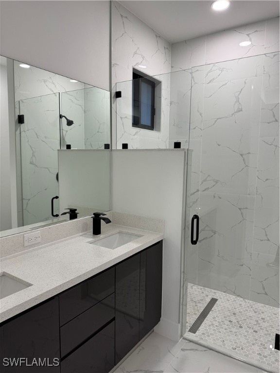 3701 East 3rd Street Lehigh Acres, FL 33936 - Photo 10 of 19 a bathroom with a sink and a mirror