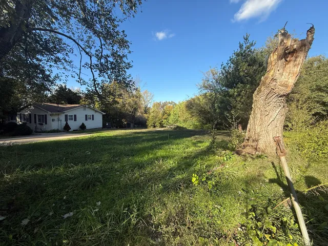 a view of a house with a park