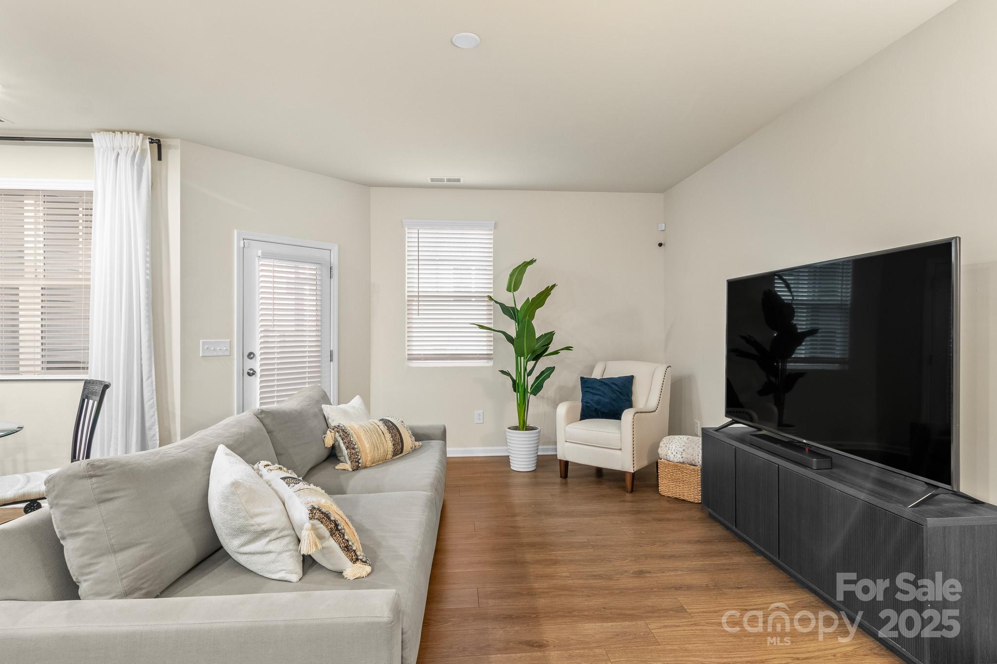 804 Gable Oak Lane Fort Mill, SC 29708 - Photo 12 of 26 a living room with furniture and a flat screen tv