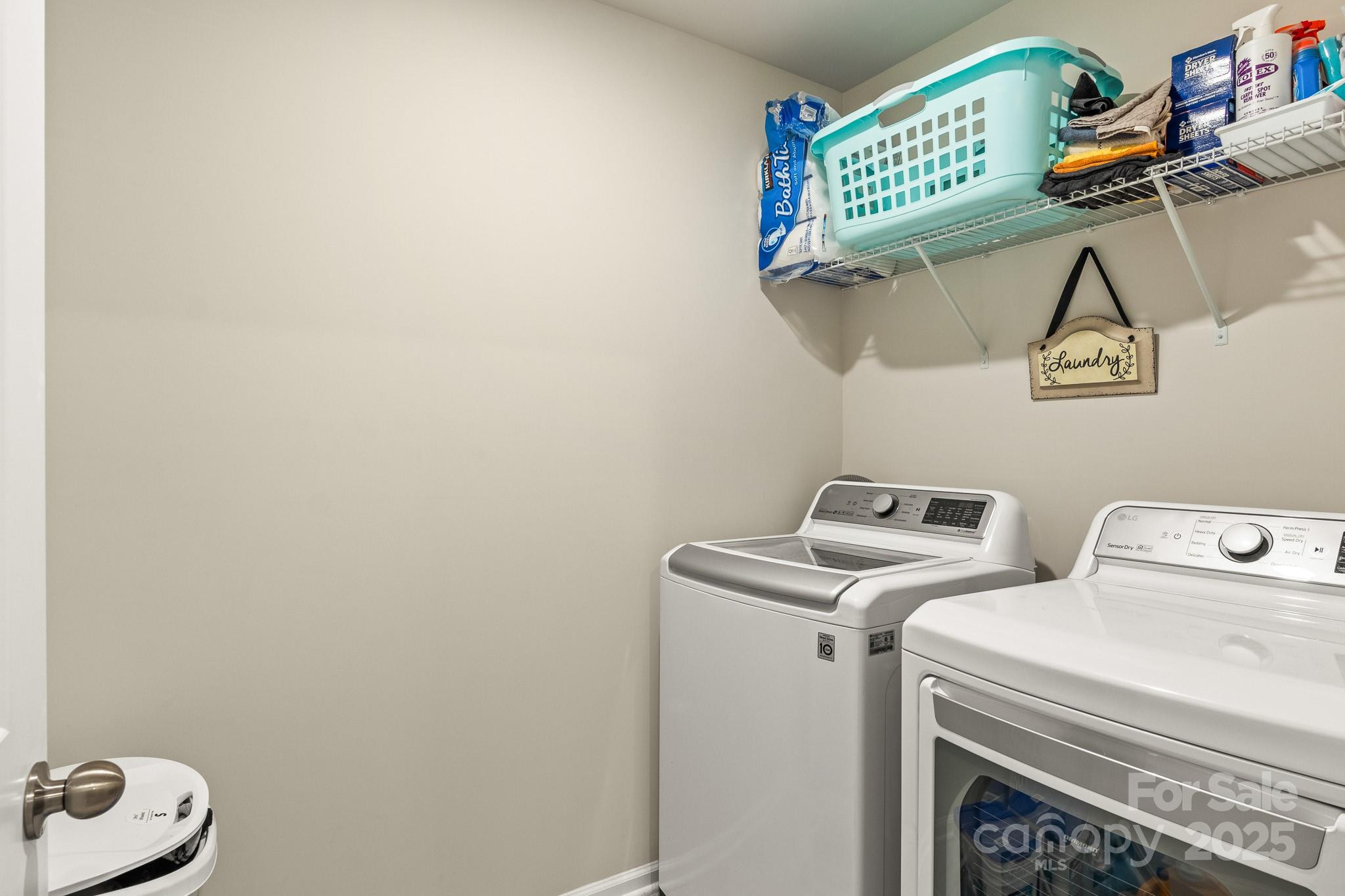 804 Gable Oak Lane Fort Mill, SC 29708 - Photo 24 of 26 a utility room with dryer and washer