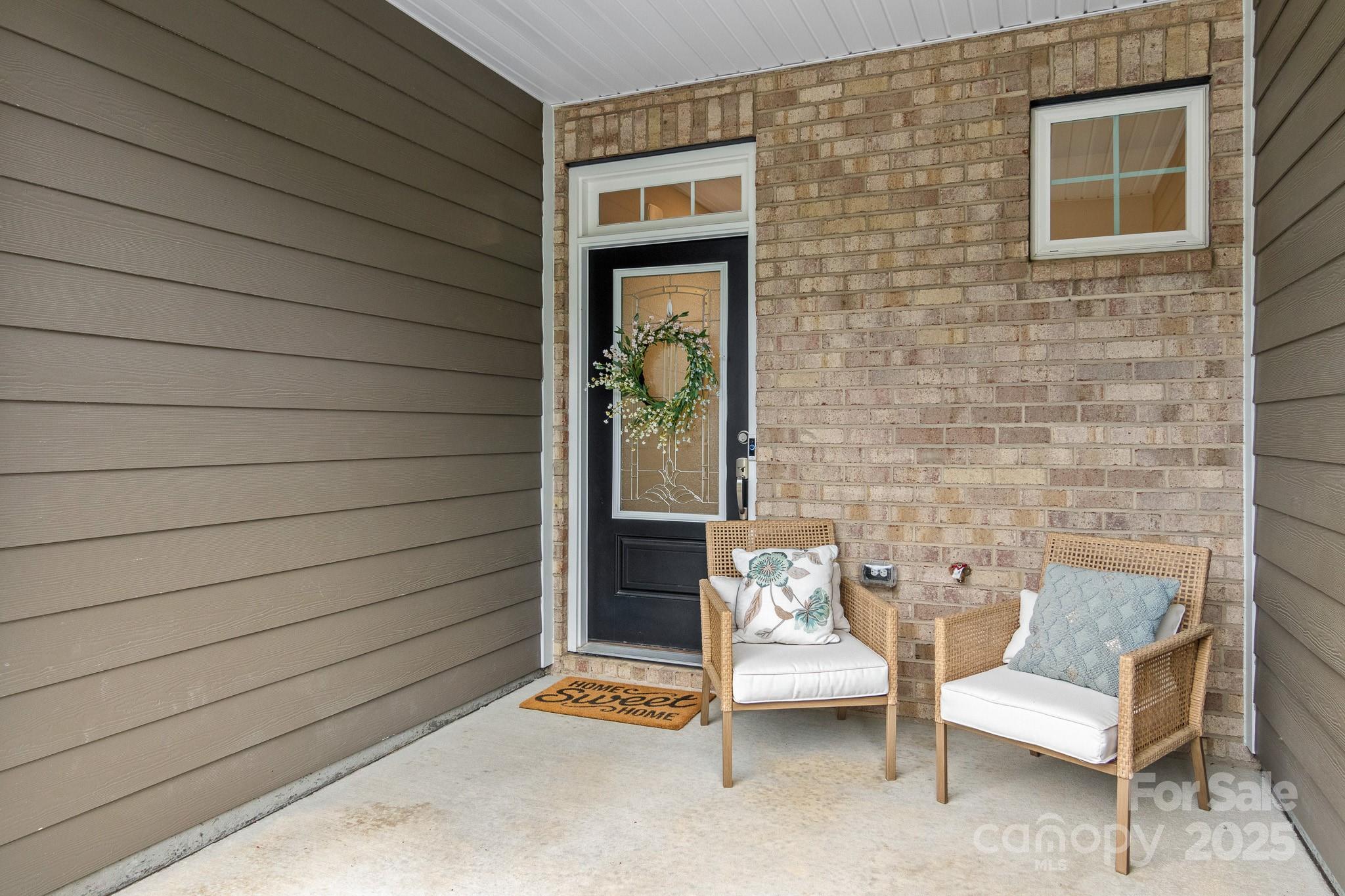 804 Gable Oak Lane Fort Mill, SC 29708 - Photo 4 of 26 a view of a patio with couple of chairs and a couch