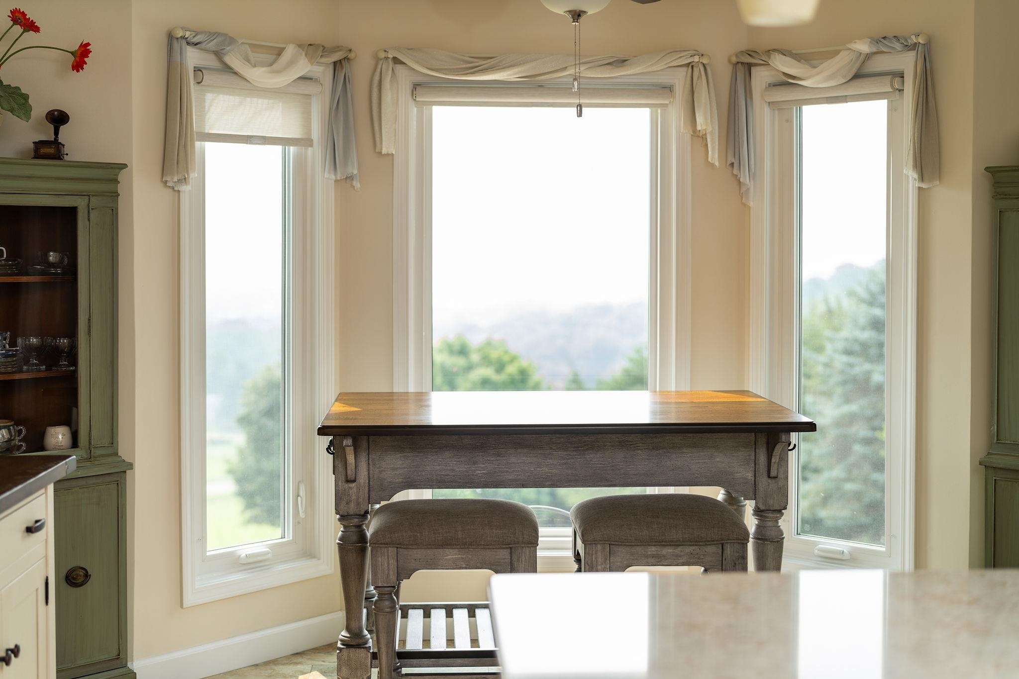 400 Quick's Mill Road Verona, VA 24482 - Photo 23 of 75 a living room with a window and a table