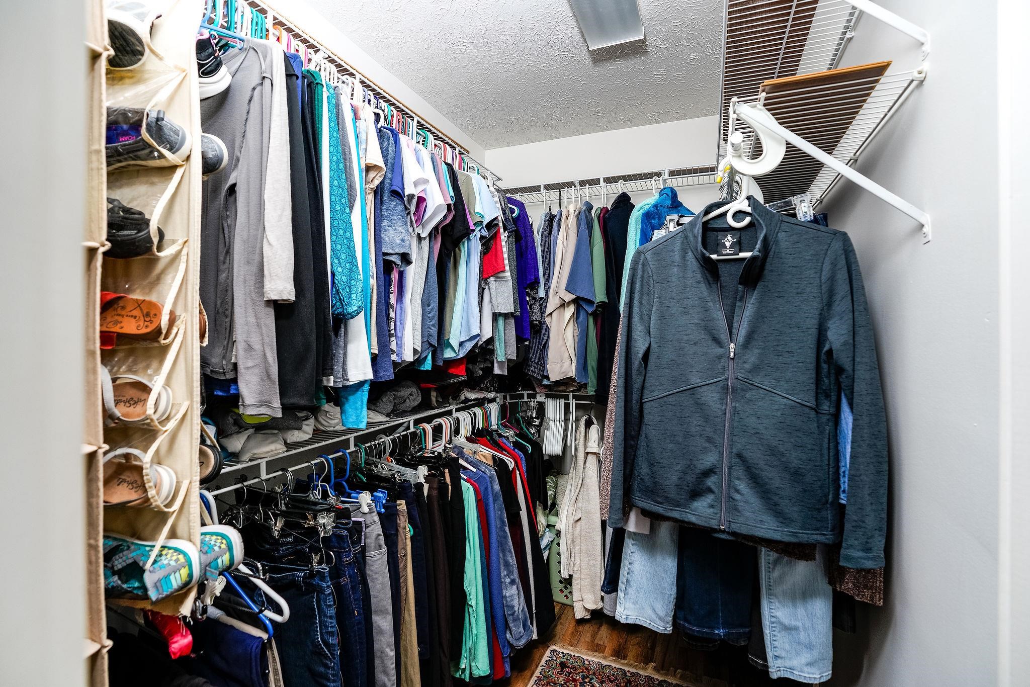 400 Quick's Mill Road Verona, VA 24482 - Photo 33 of 75 a view of walk in closet with clothes and shoes