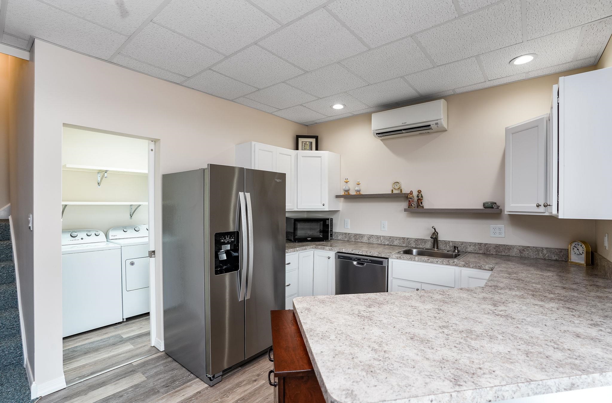 400 Quick's Mill Road Verona, VA 24482 - Photo 45 of 75 a kitchen with stainless steel appliances granite countertop a refrigerator a stove and a sink