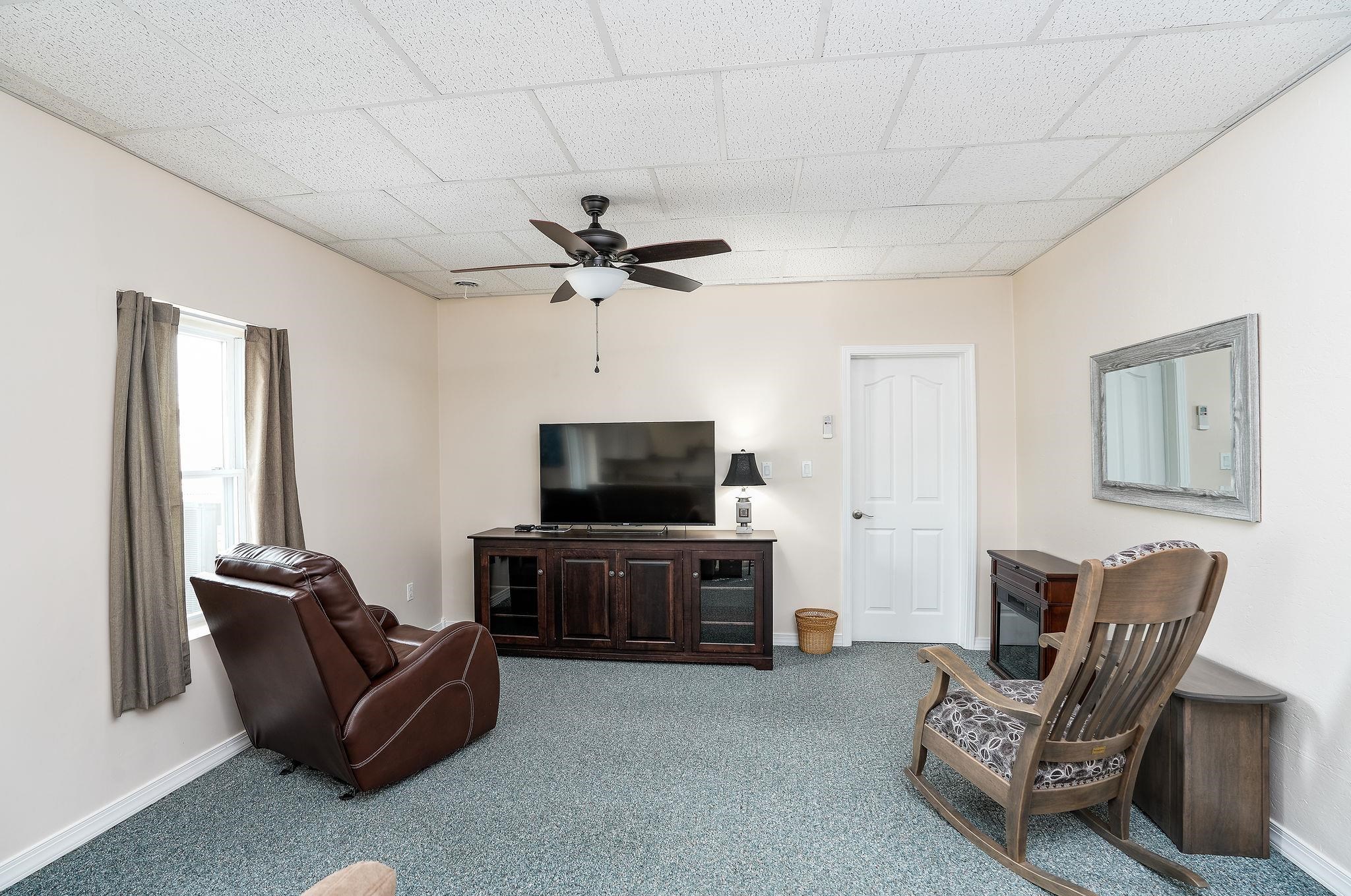 400 Quick's Mill Road Verona, VA 24482 - Photo 47 of 75 a living room with furniture and a flat screen tv
