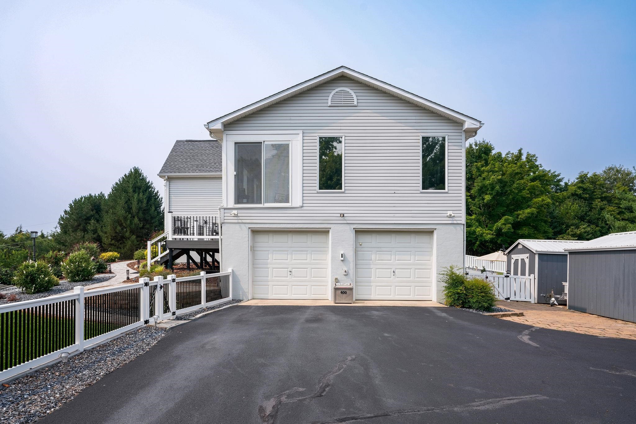 400 Quick's Mill Road Verona, VA 24482 - Photo 57 of 75 a front view of a house with a yard and garage
