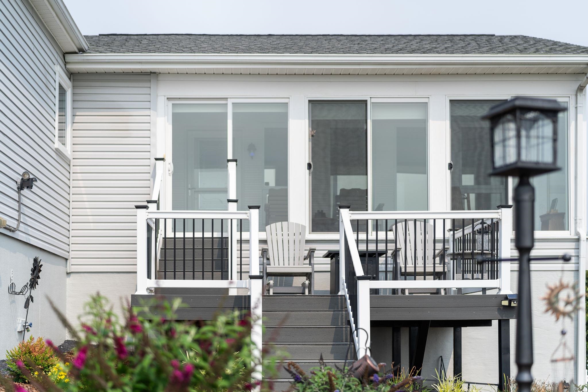 400 Quick's Mill Road Verona, VA 24482 - Photo 6 of 75 a view of potted plants and a bench in front of house