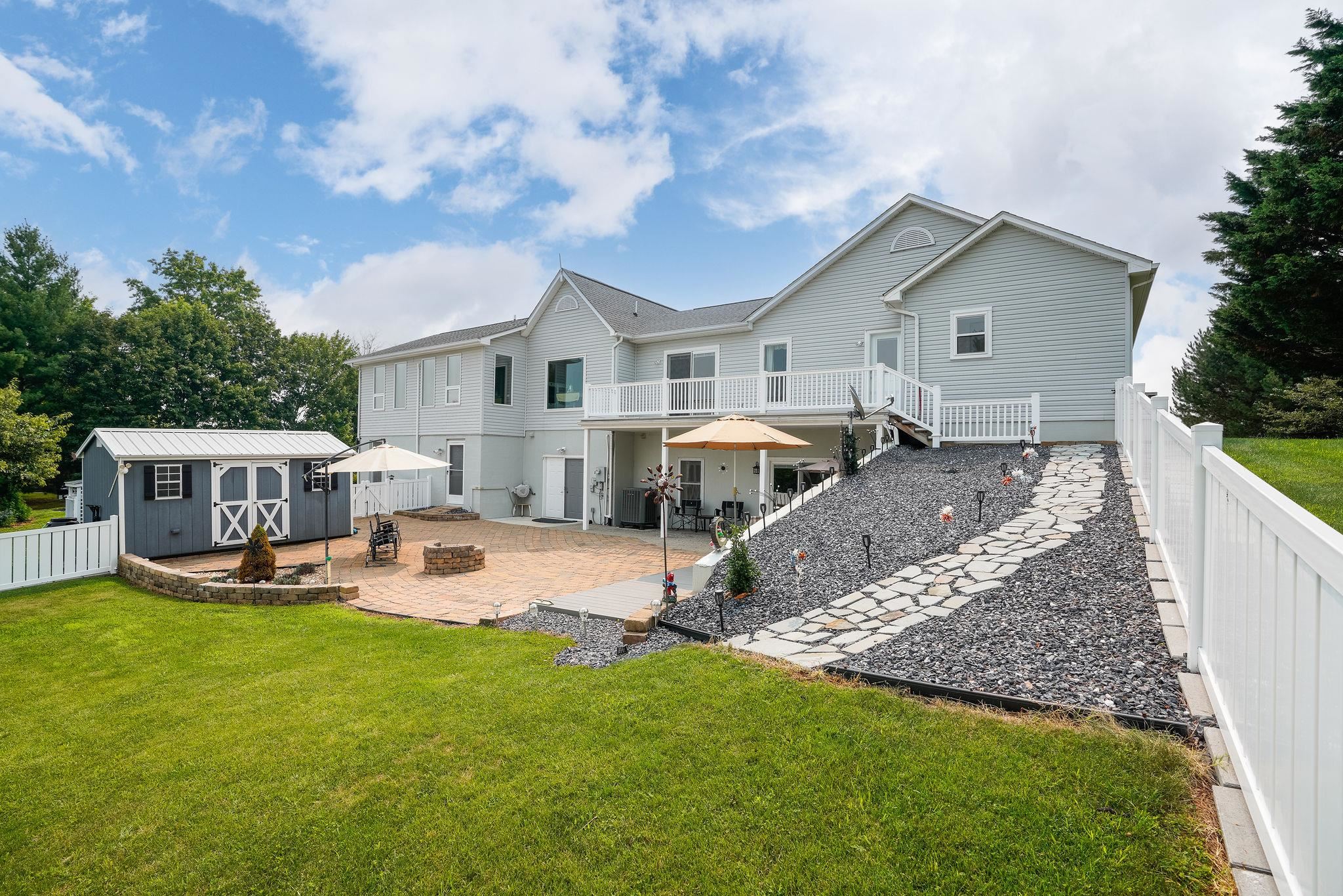 400 Quick's Mill Road Verona, VA 24482 - Photo 65 of 75 a view of a house with backyard and sitting area