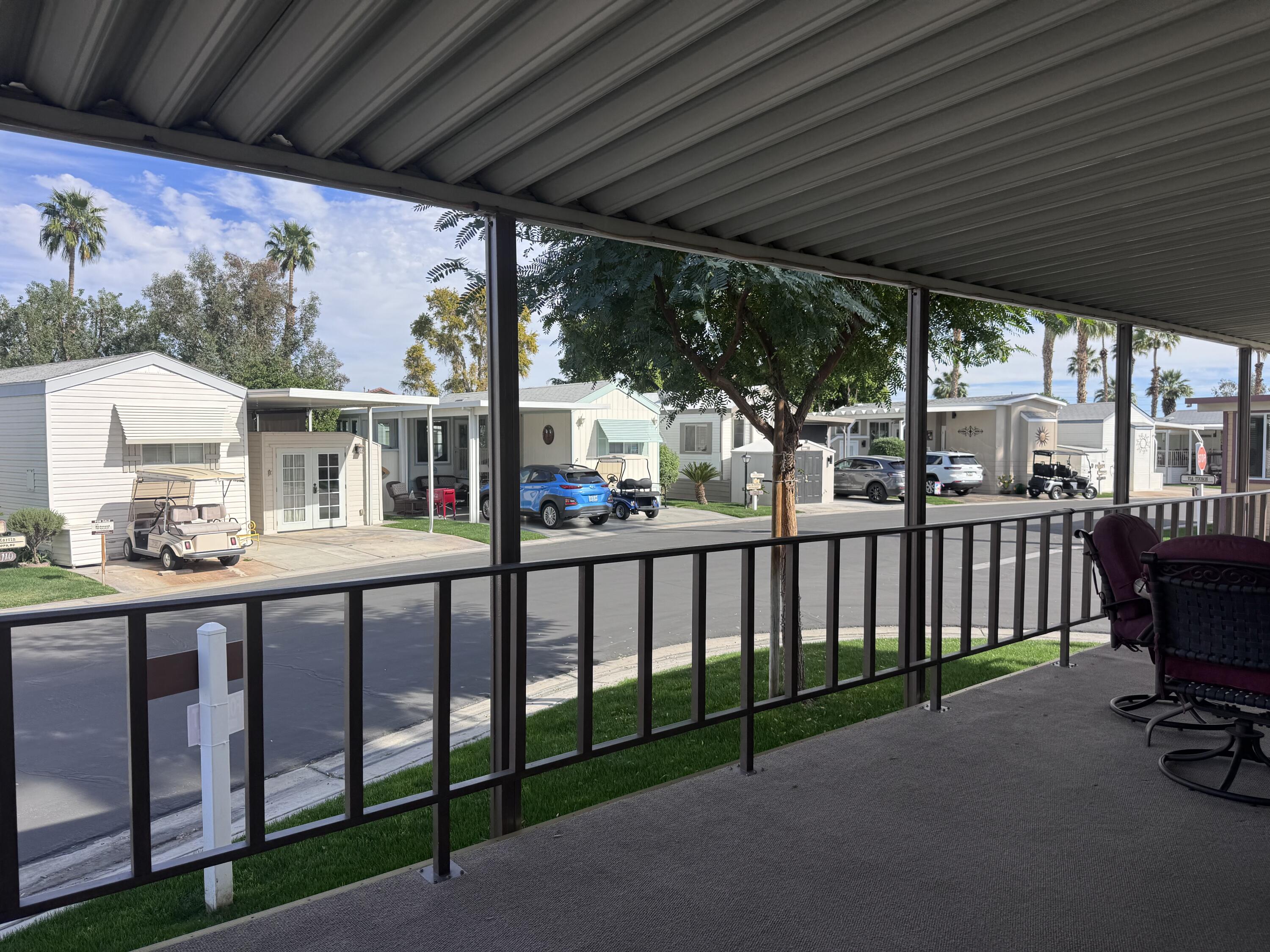 84136 Ave 44, Unit 178 Indio, CA 92203 - Photo 1 of 23 a view of a chairs and tables in the patio