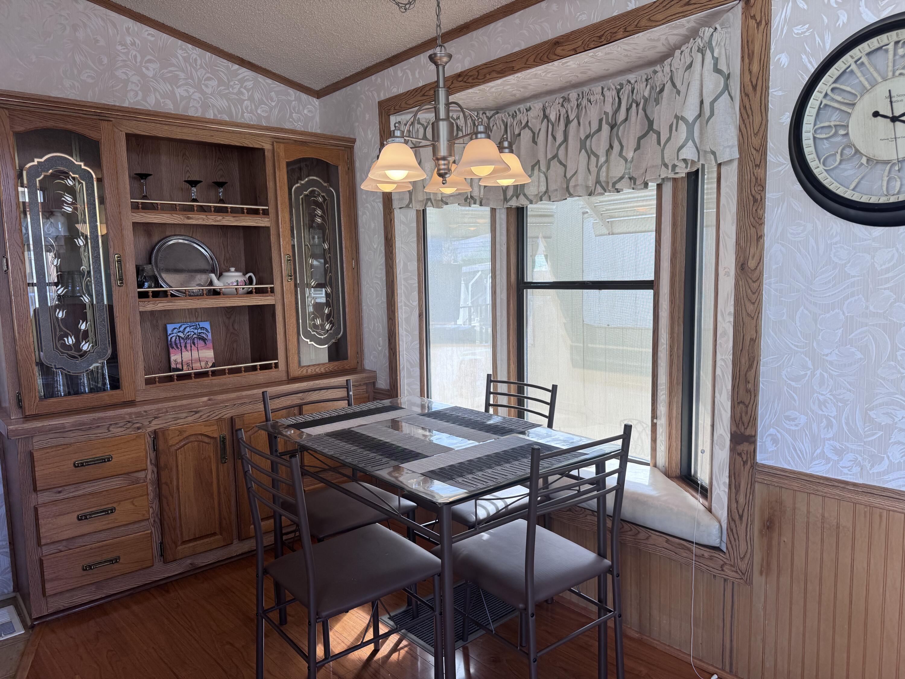 84136 Ave 44, Unit 178 Indio, CA 92203 - Photo 12 of 23 a dining room with furniture and window