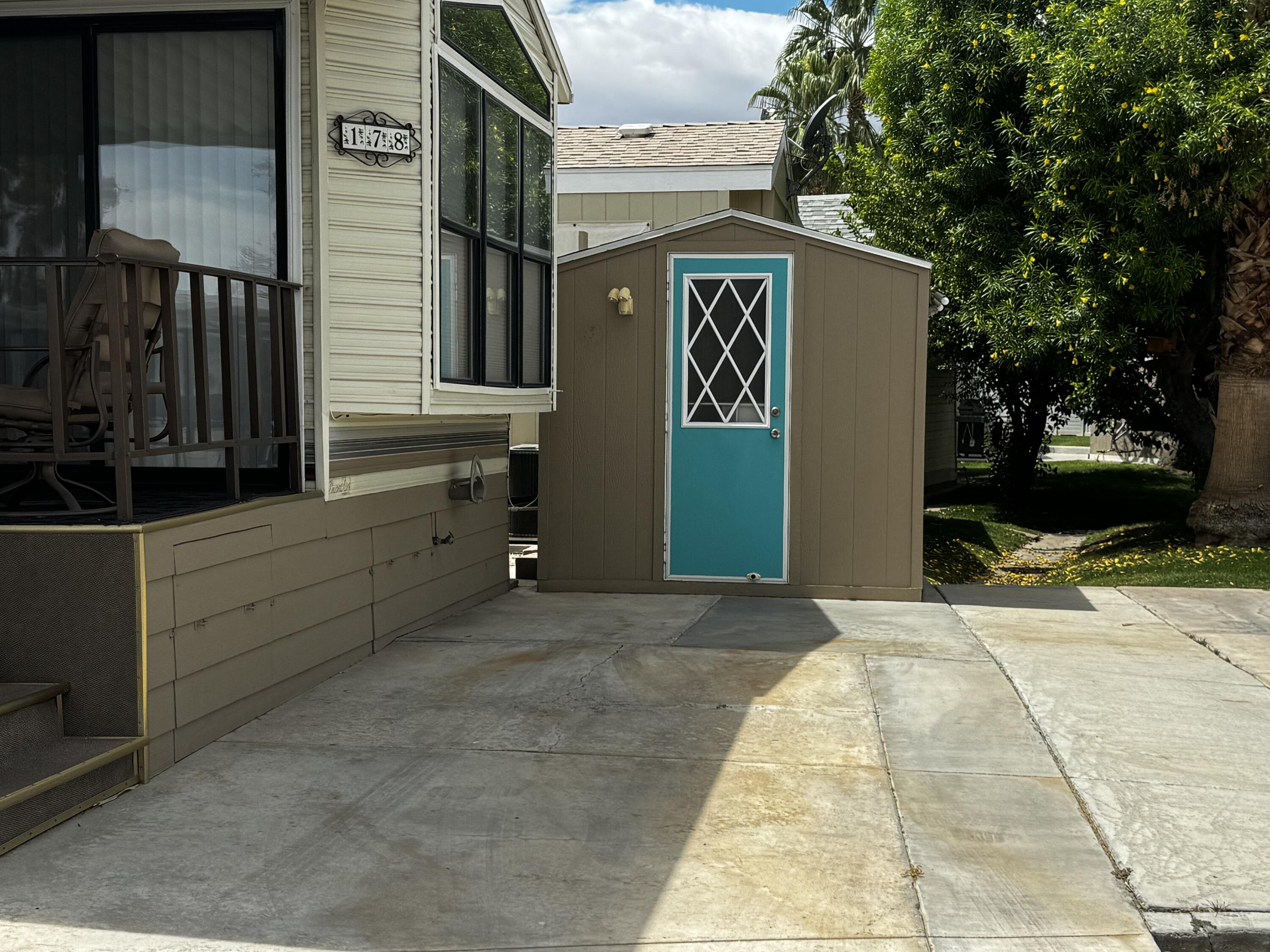 84136 Ave 44, Unit 178 Indio, CA 92203 - Photo 6 of 23 a front view of a house