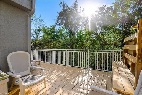 a balcony view with a garden space