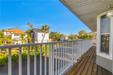 a view of a balcony with an outdoor space